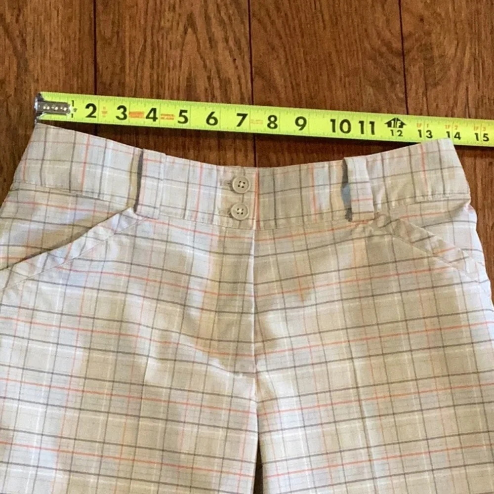 Nike Dri-Fit plaid gold shorts. Women’s size 4
